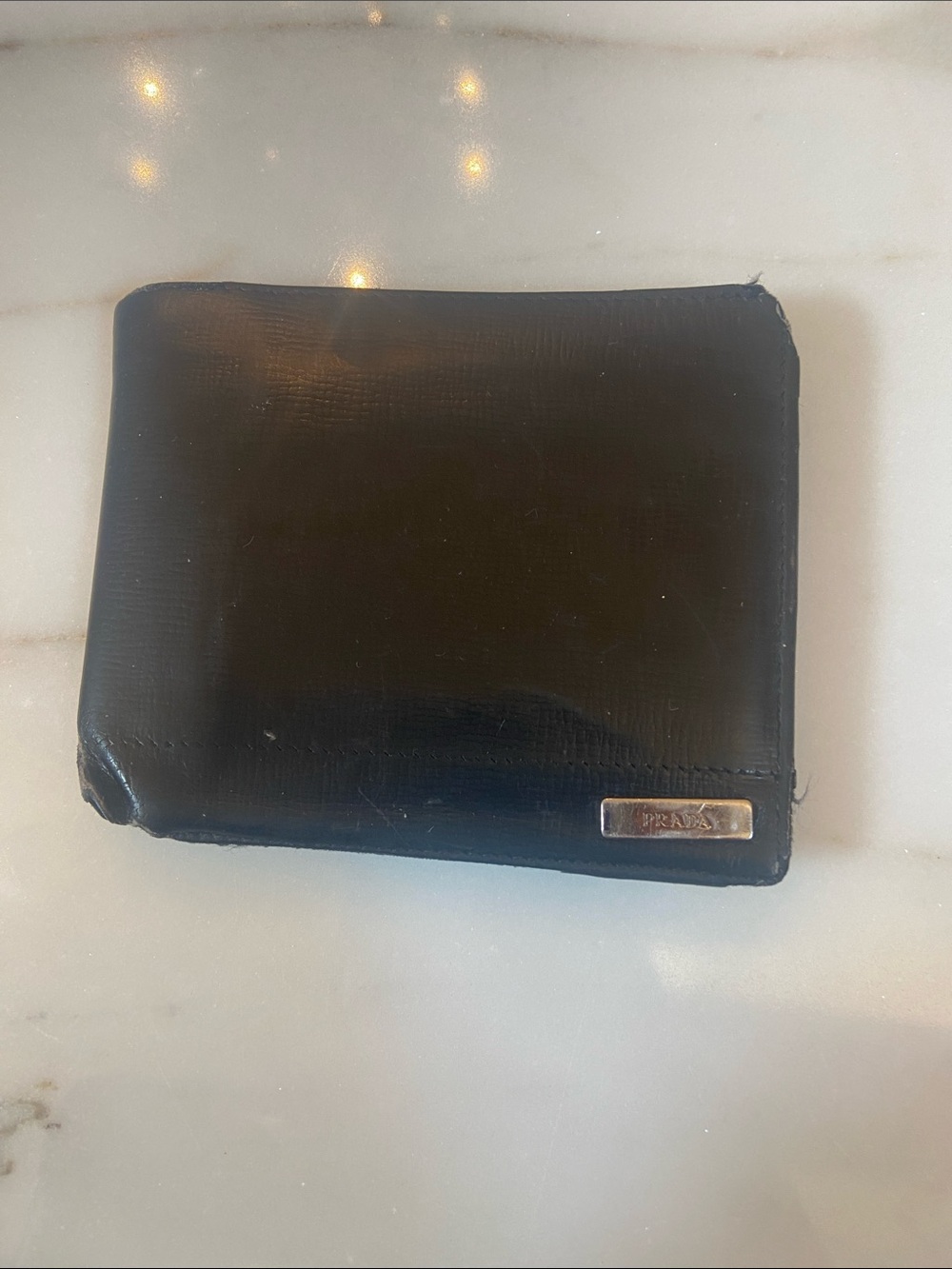 Prada Black Men’s Bifold Wallet with Metal Logo Plaque